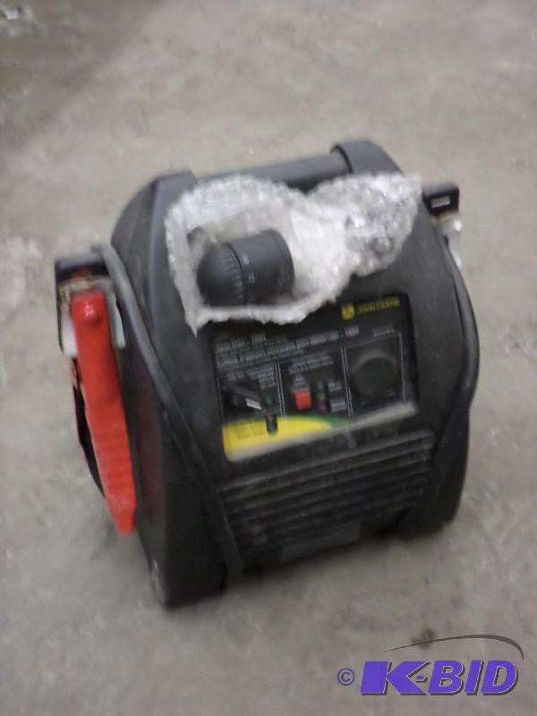lot 81 image: John Deere Potable Jump Starter...