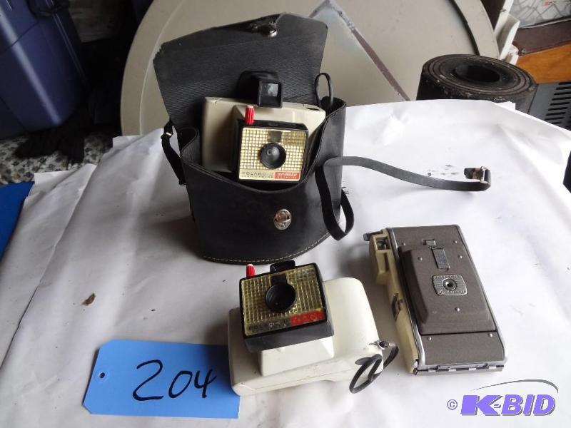 lot 204 image: Polaroid Cameras