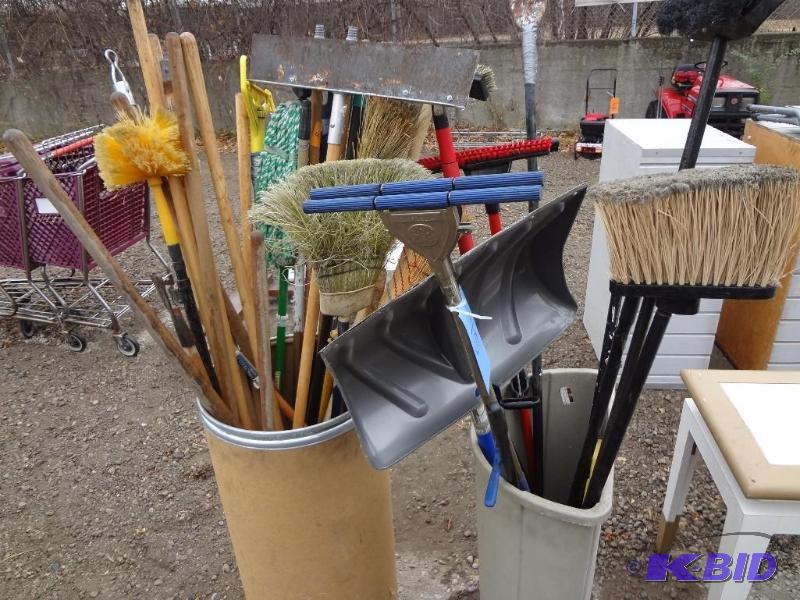 lot 45 image: Two Containers of Mops, Handles, Brooms