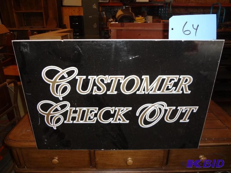 lot 64 image: Check Out Sign