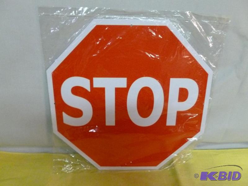 lot 128 image: Stop metal sign that measures 11 34" x ...