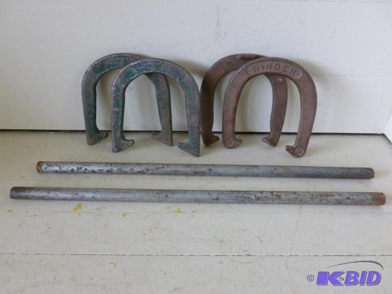 lot 206 image: Heavy duty throwing horseshoe set that includ...