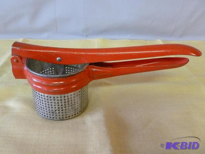 lot 36 image: Large Vintage ricer that measures 10 34"...