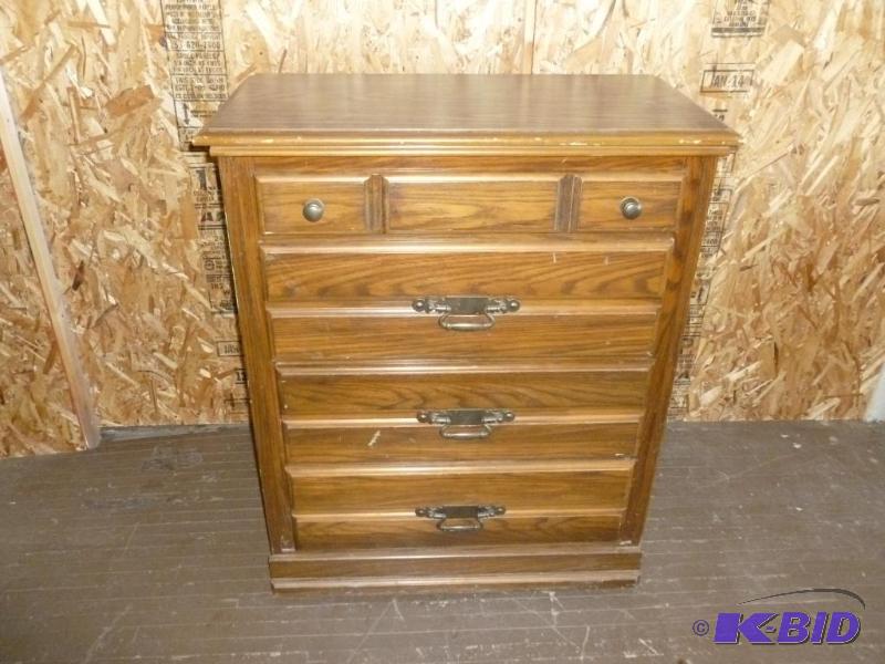 lot 4 image: Large four drawer wooden dresser that measure...