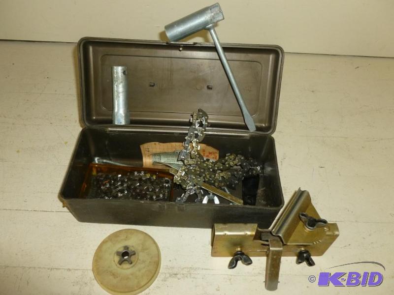 lot 49 image: Chain saw maintenance kit that includes a cla...