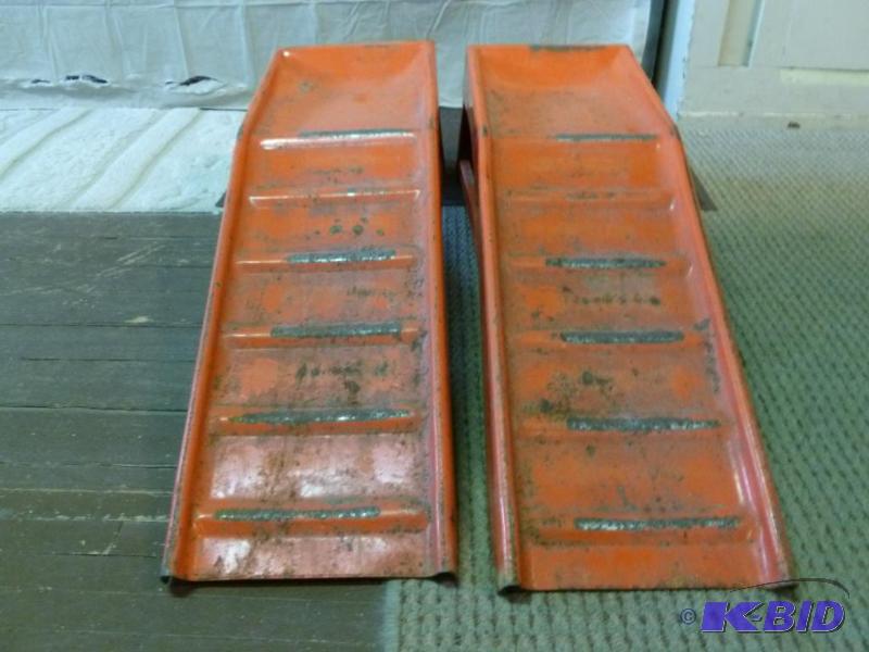 lot 69 image: A pair of heavy duty steel car ramps....