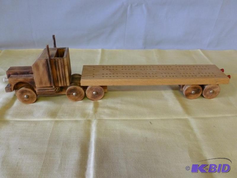 lot 8 image: Large custom made wooden semi truck rolling c...