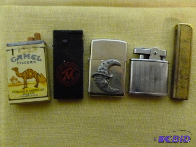 lot 82 image: Lot of five collectible cigarette lighters.&n...
