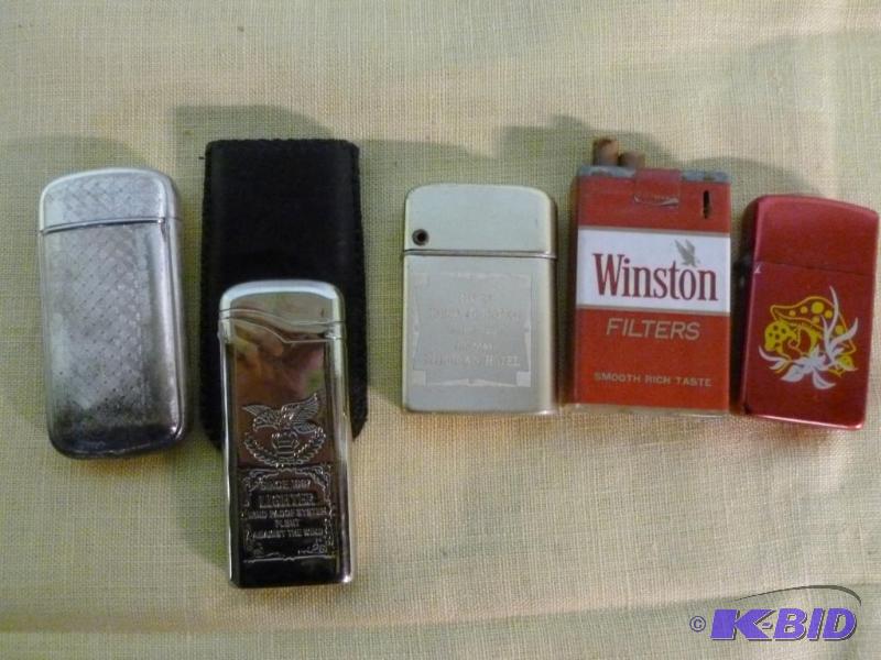 lot 83 image: Lot of five collectible cigarette lighters.&n...