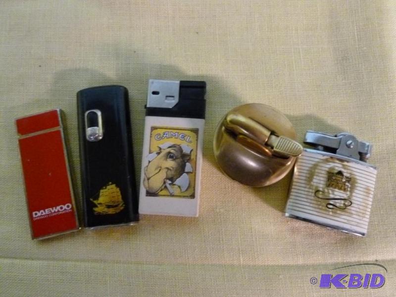 lot 84 image: Lot of five collectible cigarette lighters.&n...