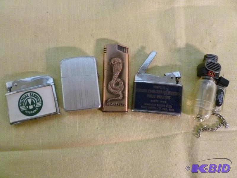 lot 85 image: Lot of five collectible cigarette lighters.&n...