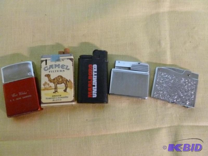 lot 86 image: Lot of five collectible cigarette lighters.&n...