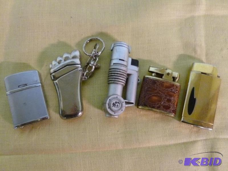 lot 87 image: Lot of five collectible cigarette lighters.&n...