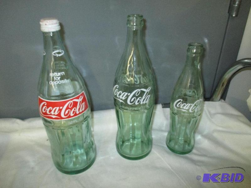 lot 60 image: Coca Cola Empty Bottles