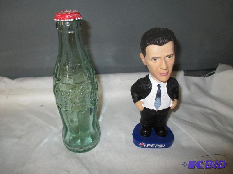 lot 61 image: Coca Cola Bottle and Pepsi Bottle head