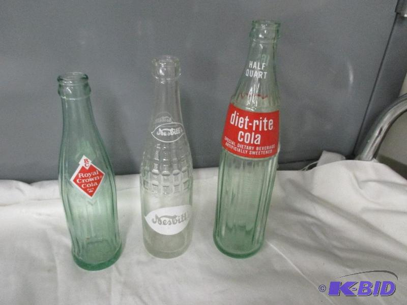 lot 62 image: Royal Crown Cola, Nesbitts bottle, Diet rite Cola bottle