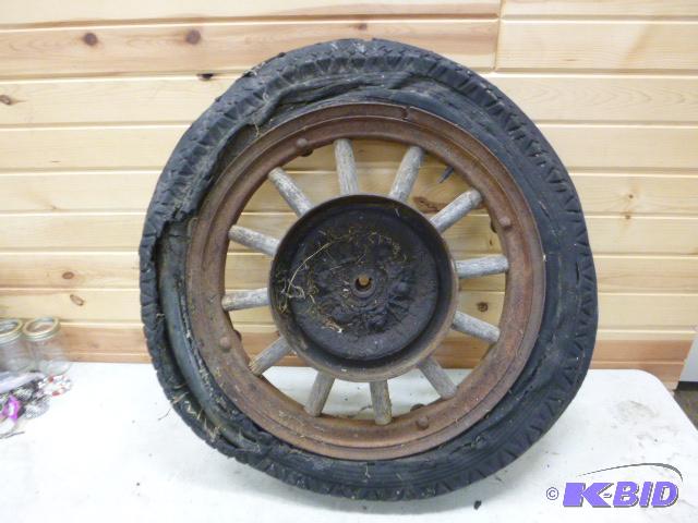 lot 177 image: Model T Tire and Rim...