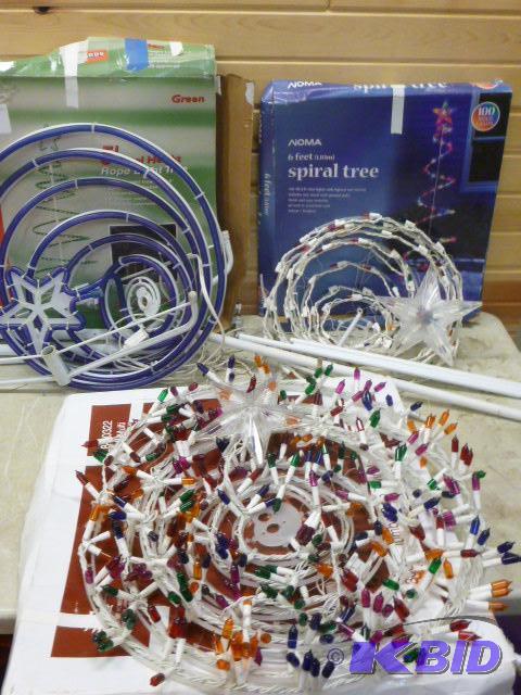 lot 23 image: Three Spiral Lighted Trees...