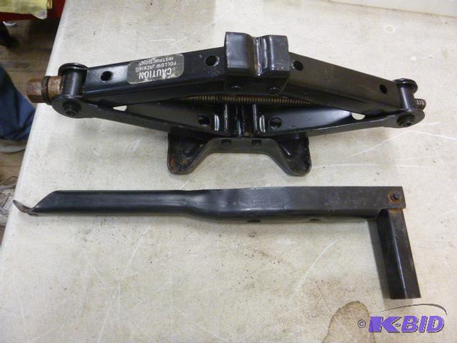 lot 6 image: Jack and Tire Wrench...