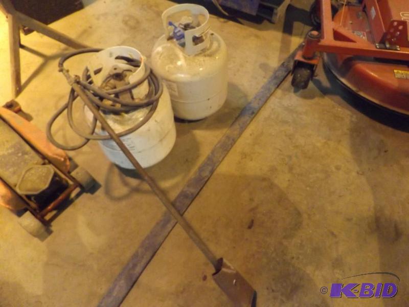 two 5 gallon propane tanks and torch...