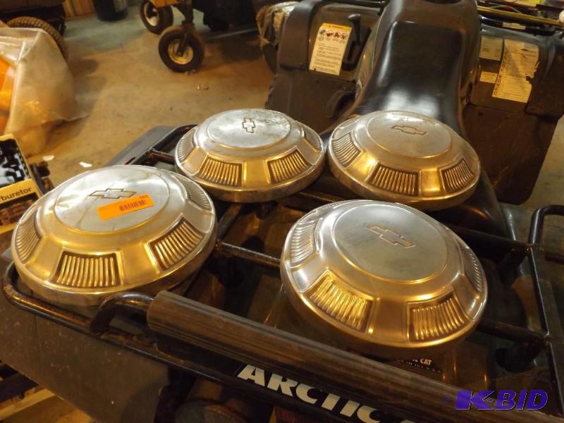 4 Chevy hubcaps...