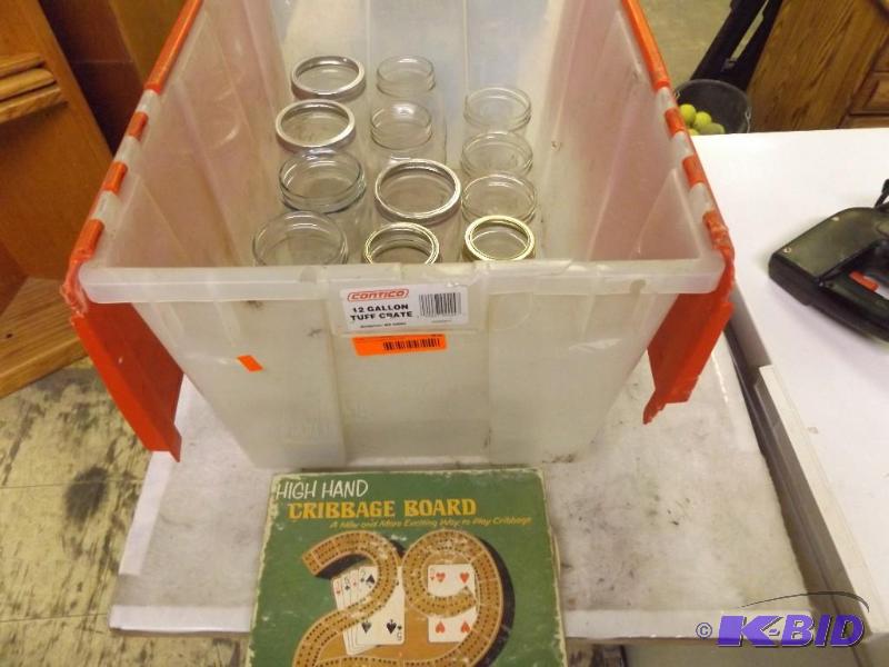 canning jars in tub and old cribbage board...