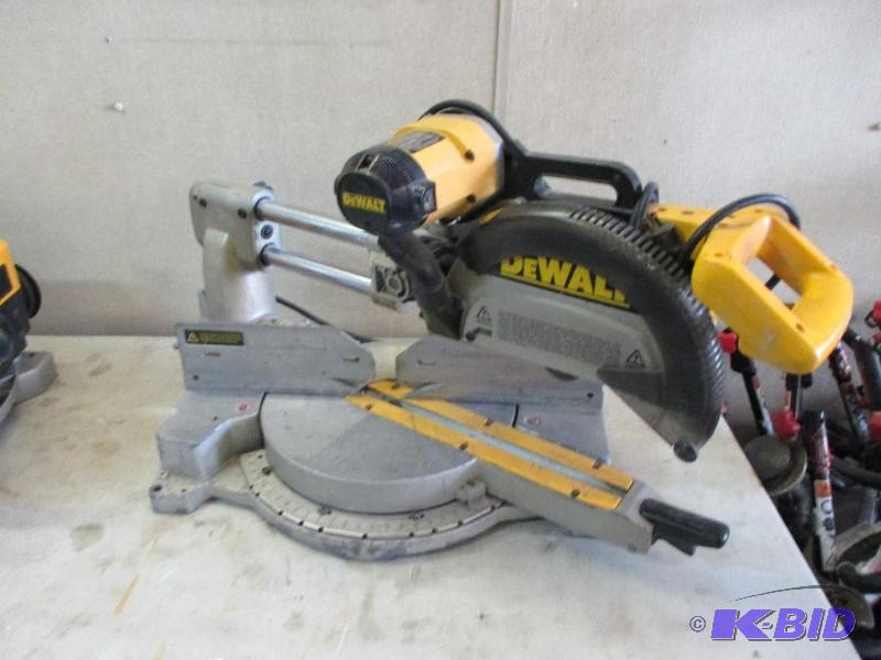 lot 15 image: Dewalt 708 Sliding miter box saw...