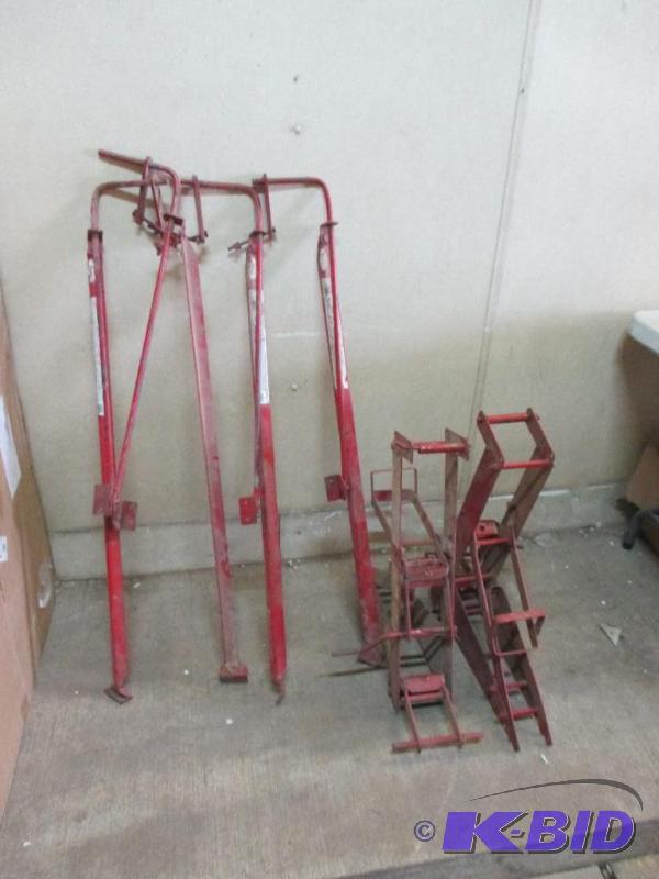 lot 22 image: 2 Pump jack mechanisms with braces, no poles...