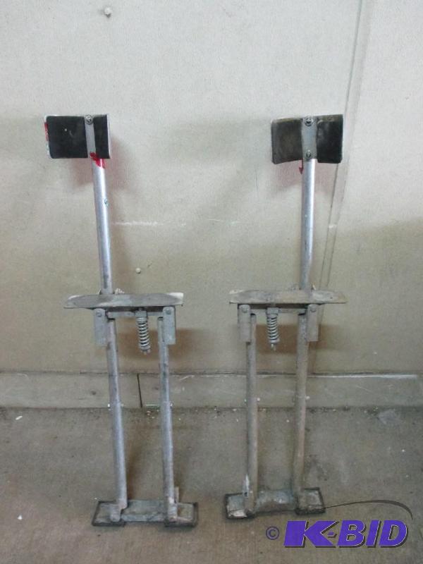 lot 26 image: pair of adjustable stilts...