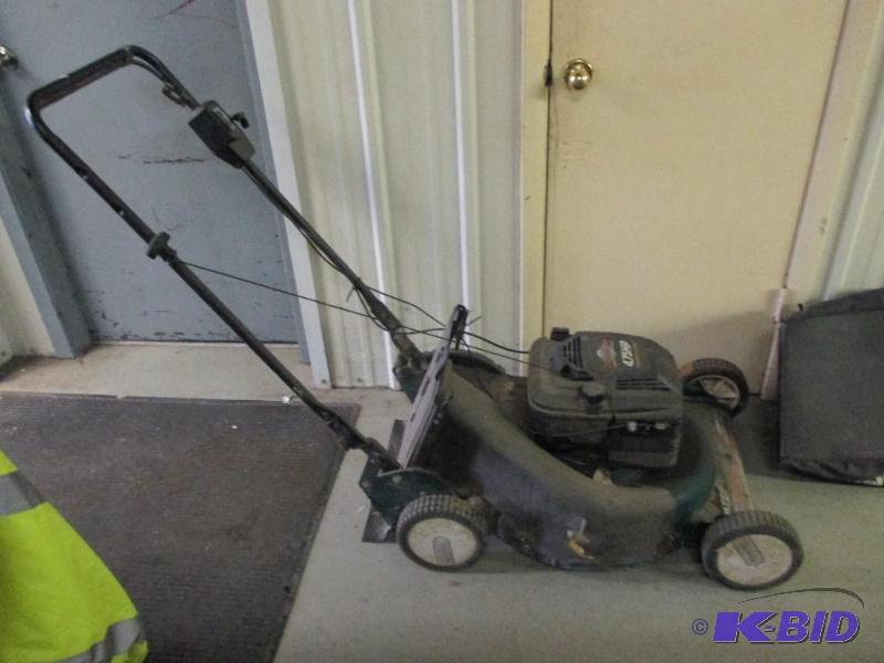 lot 38 image: push mower with bagger...