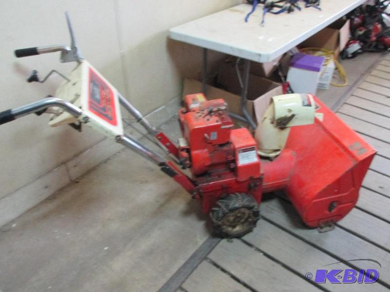 lot 39 image: 24" snowblower, just in time...