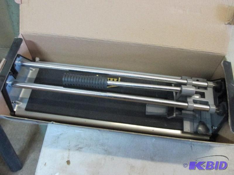 lot 93 image: MD 14" tile cutter, used twice...