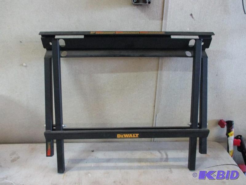 lot 96 image: Dewalt job site table saw stand, new never us...