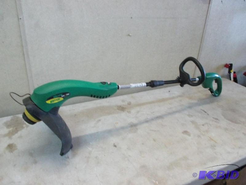lot 97 image: Weed eater electric grass trimmer, used twice...