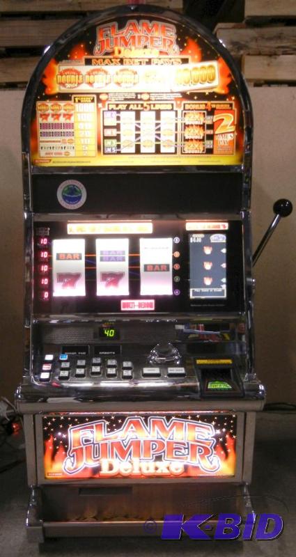lot 1004 image: KONAMI ADVANTAGE FLAME JUMPER DELUXE UPRIGHT REEL  VIDEO SLOT MACHINE