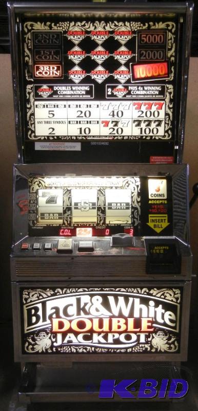 lot 1010 image: BALLY S6000 BLACK & WHITE DOUBLE JACKPOT UPRIGHT REEL SLOT MACHINE WITH 3 PAYLINES