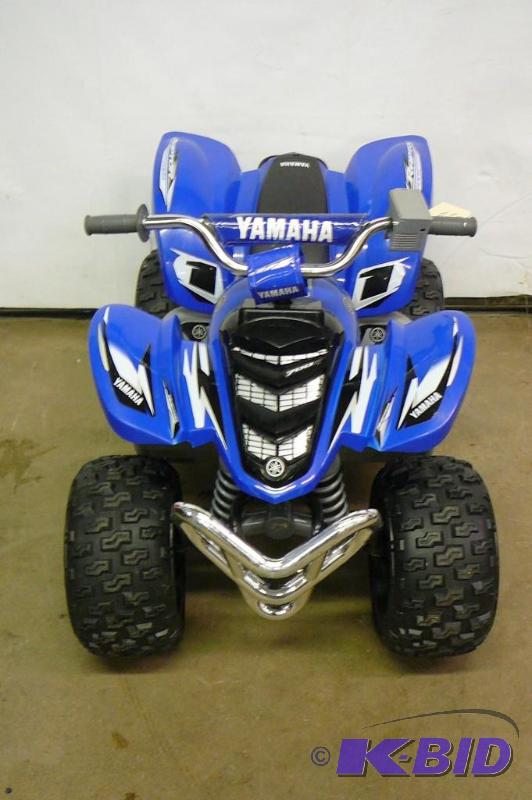 lot 12 image: Power Wheels Battery Powered Electric Kids Ya...