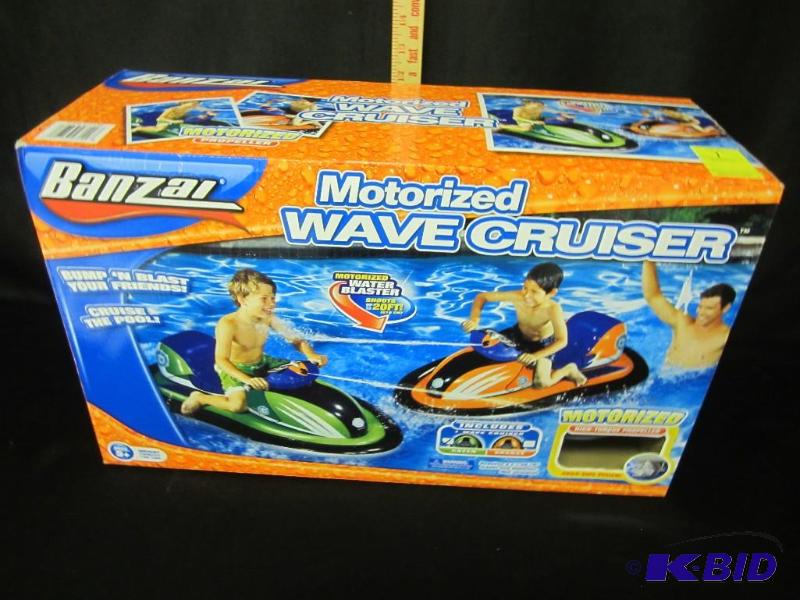 lot 1 image: New in Box Motorized Wave Cruiser