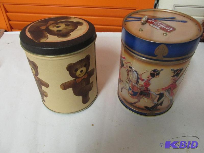 Two Holiday Tin Music Boxes.