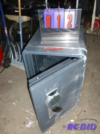 lot 12 image: First alert digital waterproof safe qty of 2....