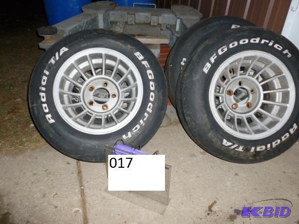 lot 17 image: 14" aluminum finned rims and tires. Appe...