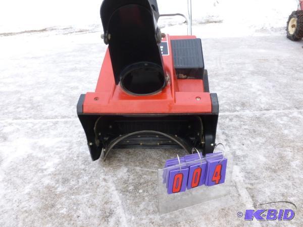 lot 4 image: Toro 2000e snow thrower. 2 cycle. Good over a...