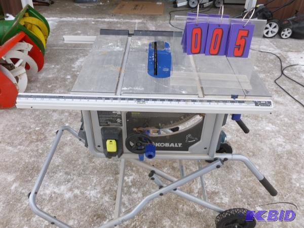 lot 5 image: Kobalt 10 folding job site table saw. Has ca...