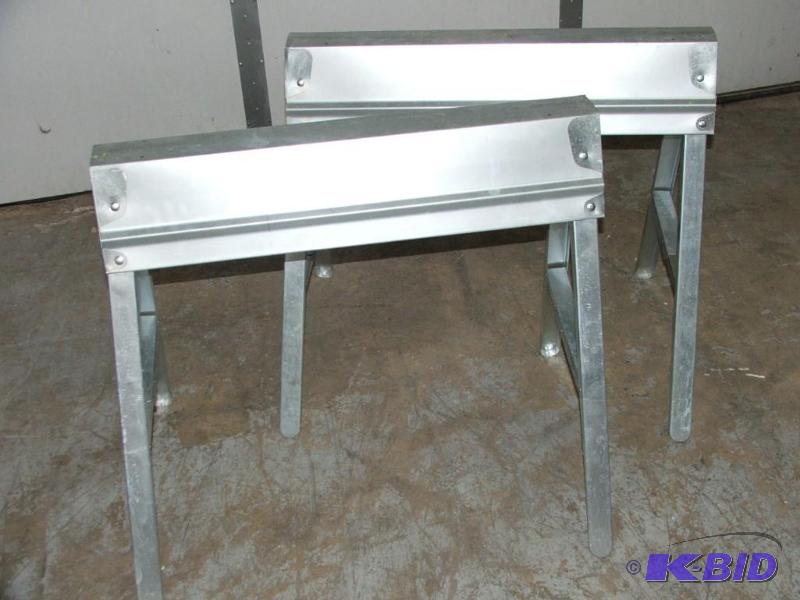 Two metal folding saw horses...