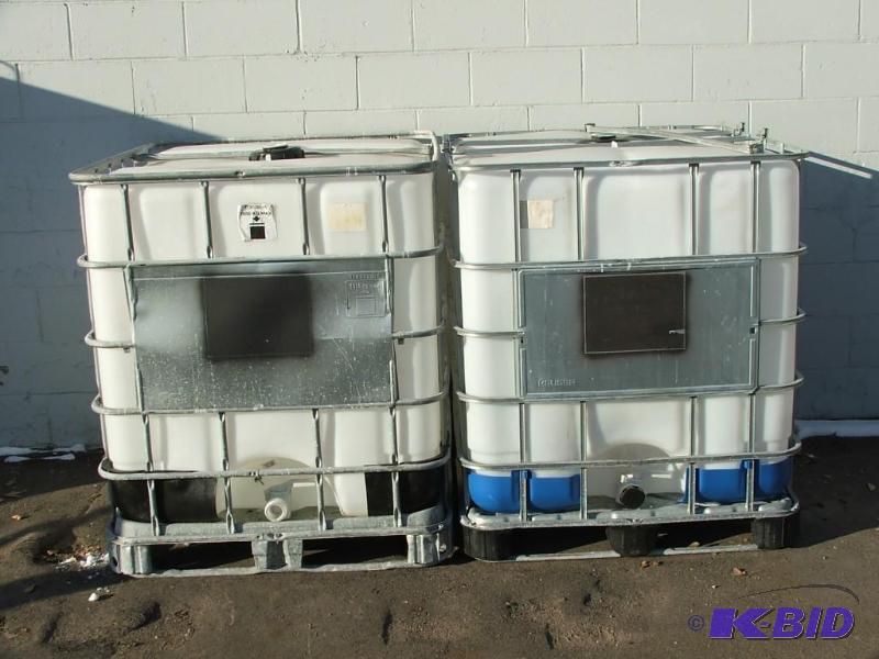 lot of 2 275 gallon liquid totes with top fil...