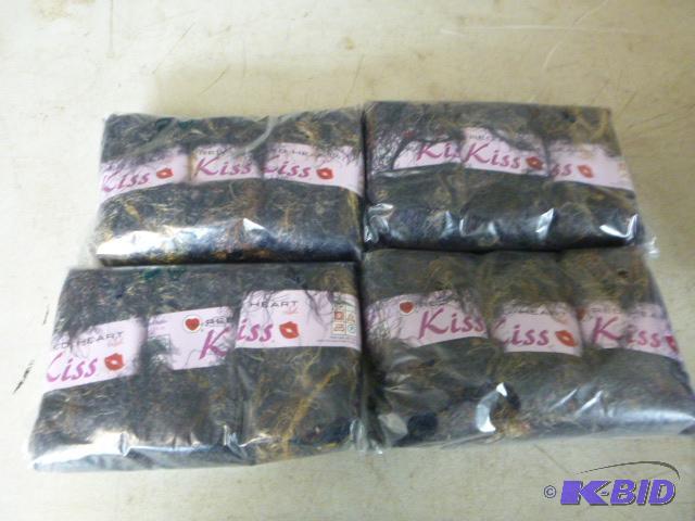 Four Packs of 3 Red Heart Kiss Yarn...
