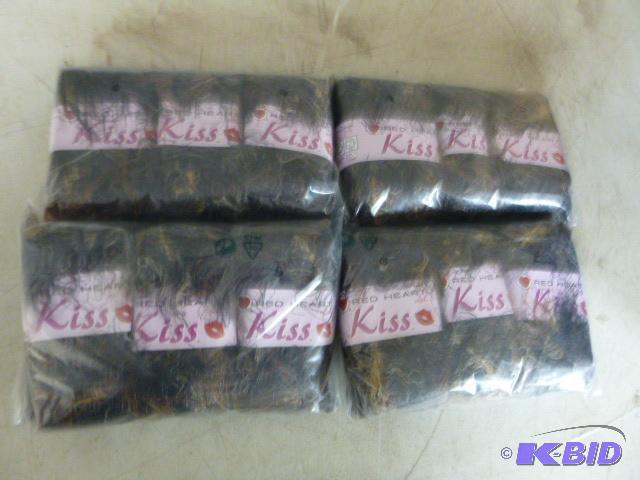 Four Packs of 3 Red Heart Kiss Yarn...