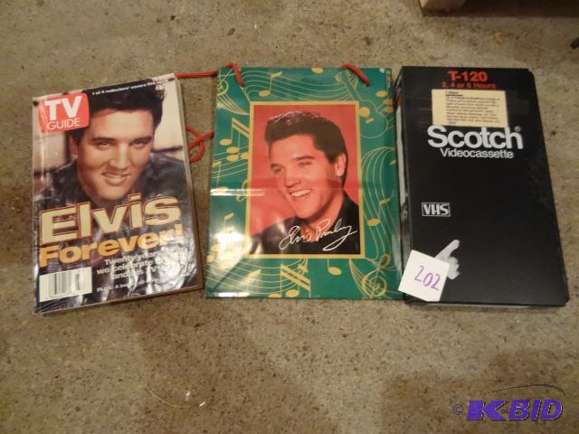 lot 202 image: Elvis Tribute VHS Tape. Gift Bag. TV Guide...