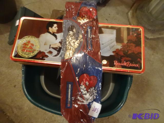 lot 205 image: Elvis Tie. Metal Russell Stover Chocolate Tin...