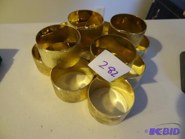 lot 282 image: Brass Napkin Rings...